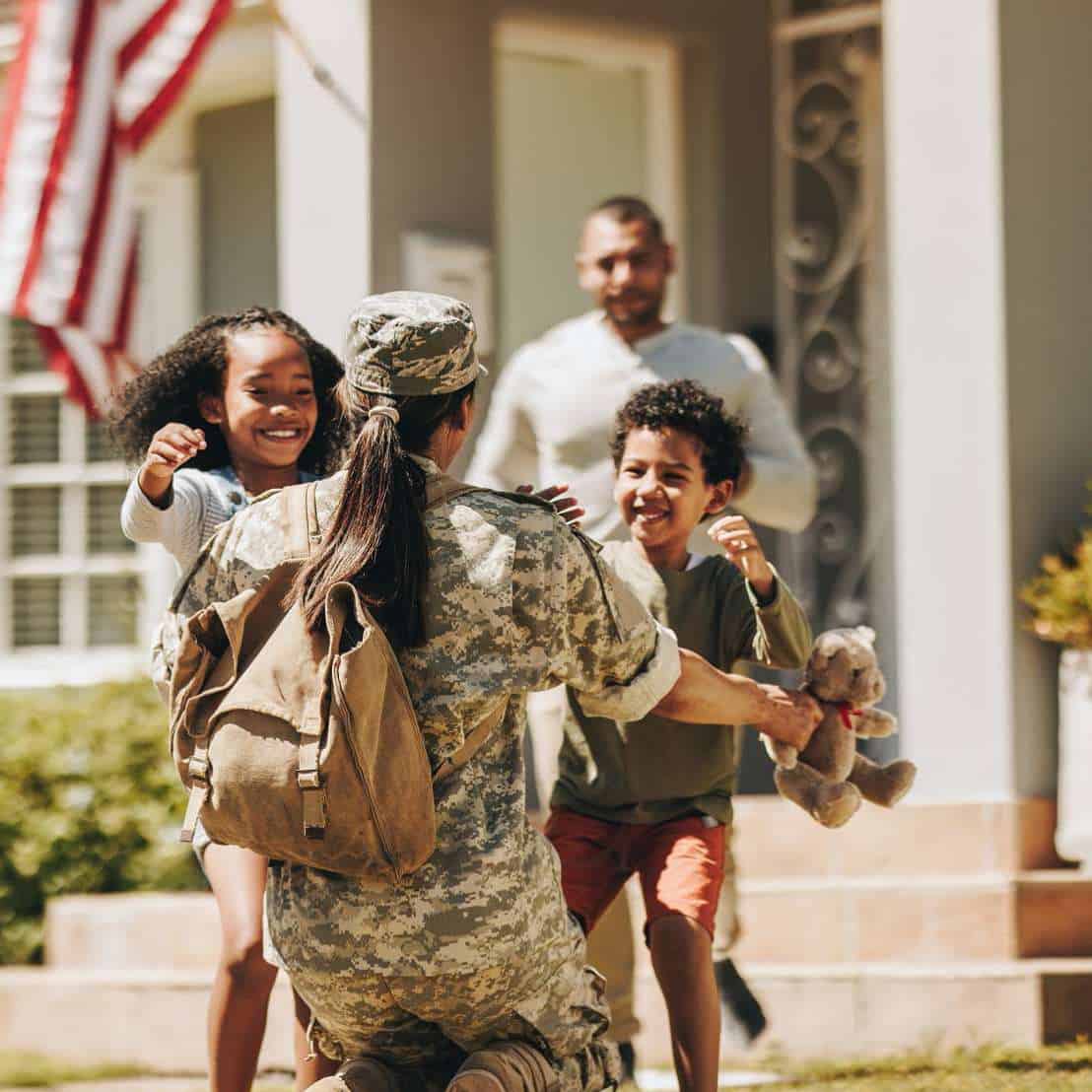 Military mom greeting her family